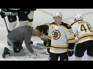 Rask leaves game after taking josi slapper off mask