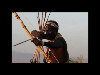 Ancient modern examples of holding arrows in the hadza style