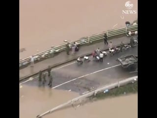 Japanese government says at least 100 people have died or are presumed молодые from heavy rains, flooding and mudslides in western