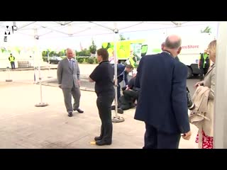Asda worker faints in front of prince charles during visit to thank staff