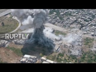 Syria drone footage captures strikes on militant positions in damascus