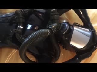 Woman latex gasmask