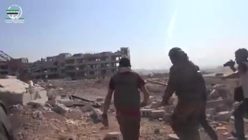 على تخوم مدينة حلب, من داخل مدرسة الحكمة المحررة ضمن المرحلة الأولى لمعركة تحرير حلب