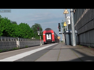 Groe sudostbayernbahn zuge in ampfing zur hauptverkehrszeit (br 218, 245) +grune lagune [km 66,8]