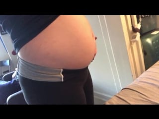 Bloated belly in tight pants