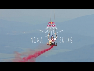 Skydivers play on the ultimate mega swing