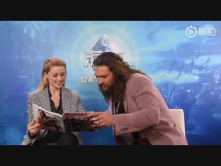 Heard addicted on instagram amberheard and jasonmomoa flipping through an old version of justiceleague in a chinese magazine me