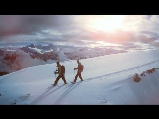 Hiking in the snow hikers walking foot feet steeps snow winter landscape