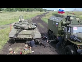 Russian pit stop russians lifting a tank with a pneumatic jack