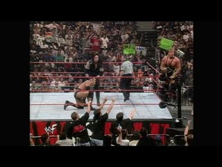 Wwf raw is war the rock & owen hart vs undertaker & steve austin