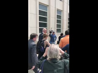 Allison mack leaves the court after pleading guilty