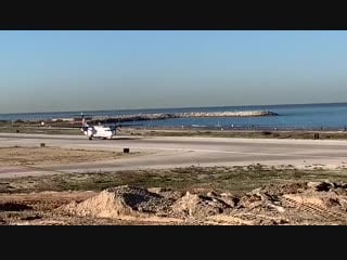 This plane taking off with the propellers perfectly synced with the camera shutter