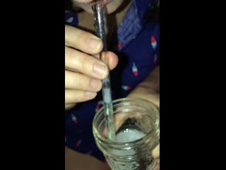 Milf sucks nasty thick loads through a glass straw and swallows