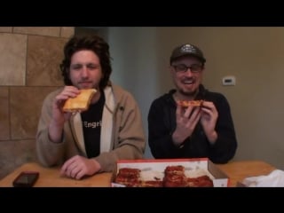 Brad tries little caesars bacon wrapped crust pizza