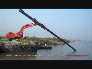 Excavator with telescopic arm attachment