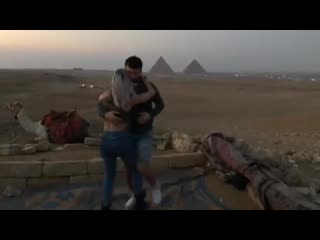 Sara lopez and ronie saleh dancing at the pyramids