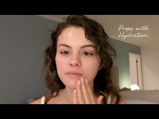 Selena gomez teaching about always an optimist illuminating primer from rare beauty line on sephora