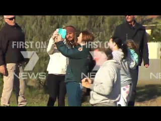 Locals on brisbanes bayside getting selfies with captain jack sparrow