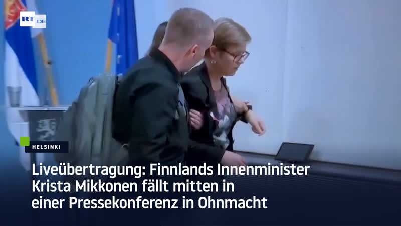 Liveübertragung finnlands innenminister krista mikkonen fällt mitten in einer pressekonferenz in ohnmacht