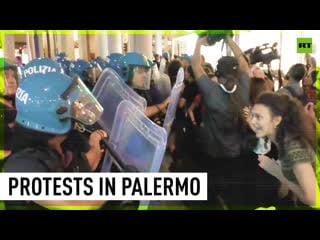 Protesters in italy denouncing pm candidate clash with police