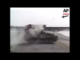 Iraqi tanks hit, british soldiers, armoured vehicles firing
