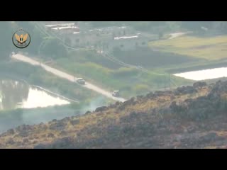 Nlf pulled off a quality tow missile strike on a moving syrian loyalist pick up truck from a weird angle today on al huwayz fro