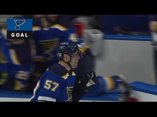 David perron dekes around a sprawled out darcy kuemper before slipping puck into net