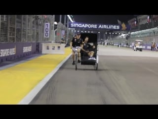 The singapore trishaw max verstappen and daniel ricciardos marina bay track g