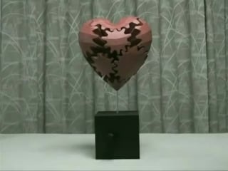 Japanese wooden sculpture of a mechanically driven heart