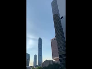 Tear gas canisters filmed raining in hong kong against all regulations, while police deny firing from height