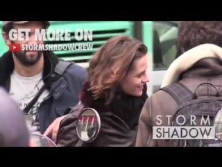 Kristen stewart driving a scooter outside gare du nord