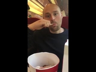 Lad shows how to eat a chicken drumstick
