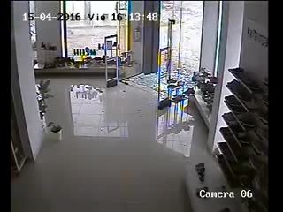 Watch as a tornado continuously gets closer to this shoe store