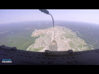 Video of massive us humvee airdrop from c 17 drop over white desert