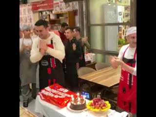 That smiling guy cutting onions