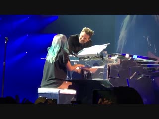 Bradley cooper attends enigma show and joins lady gaga on stage to perform shallow