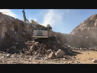 Liebherr 984 excavator loading cat dumpers and operator view sotiriadis brothers