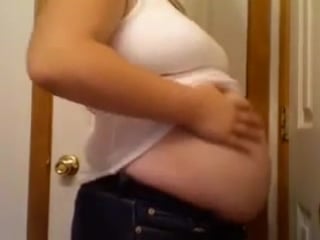 Big fat belly girl in white shirt