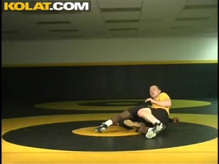 Wrestling kolat whizzer pull up to step over