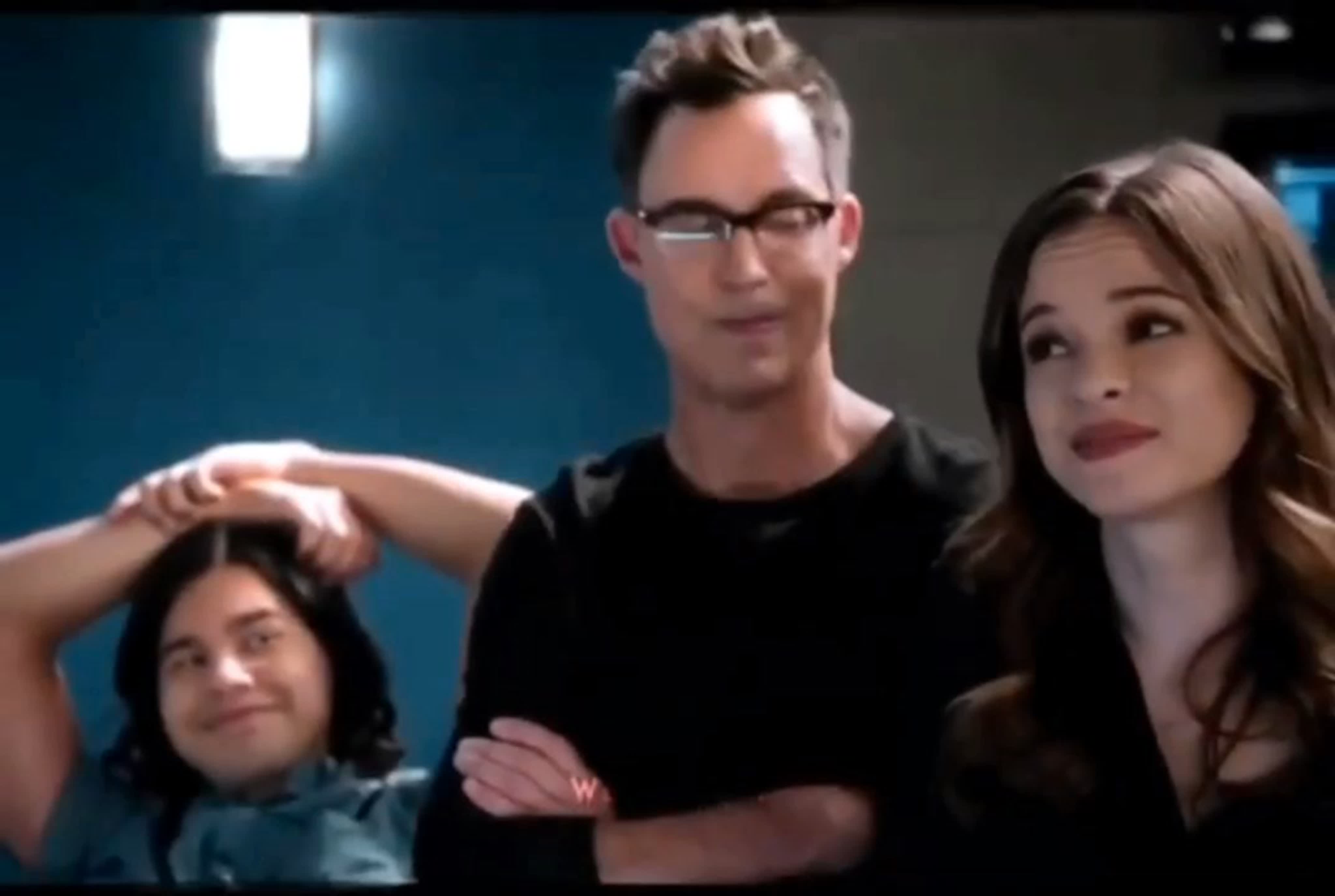 Caitlin Snow, eyes half-closed, enjoys a moment of pure bliss