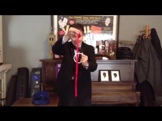 A ring and a ribbon with woody pittman