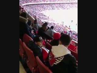 Mesut #ozil at the game today with a young fan