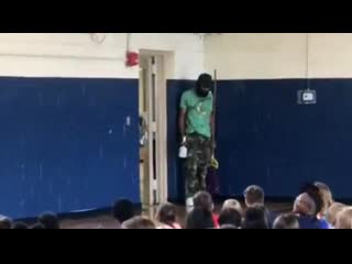 Porn in elementary school hold a surprise birthday party for their beloved school custodian