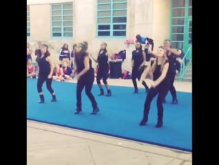 My squad killed it at yesterday's pep rally that's me in the middle all bent down getting crunk lol i'm so proud of my girls!