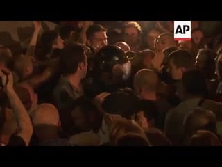 Protesters flee tear gas outside georgian parliament