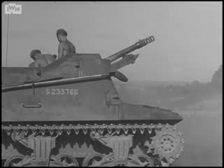 Self propelled artillery goes into action in the mont pincon sector of 30th corps front