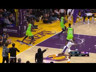 Lebron james rises up and throws it down