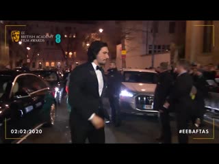 Прибытие на красную дорожку bafta