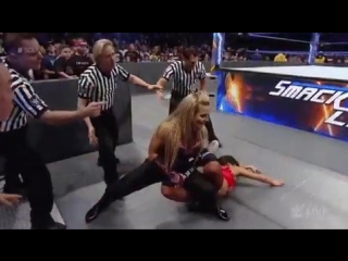 @natbynature hooks a #sharpshooter on nikki @bellatwins in the aisle, as bella screams in pain #sdlive