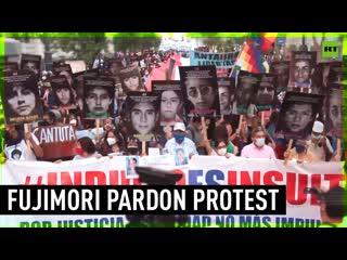Protesters march against pardon of former peruvian president fujimori